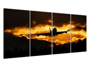 Přistávající letadlo při západu slunce - obraz